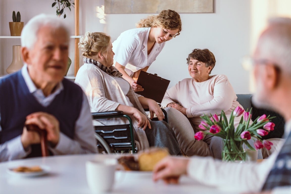 healthcare-worker-with-senior-patients-at-a-table-2026-09-22-18-23-47-utc (Medium)