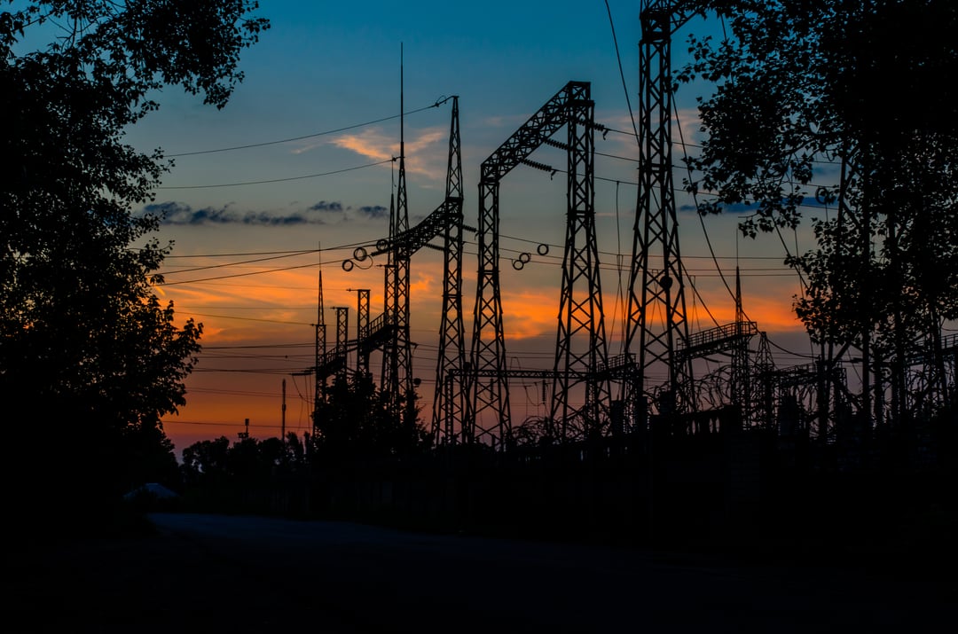 A power station in the dark to signify a power outage.