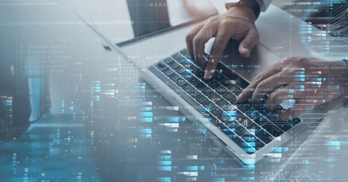 Photo of hands on a laptop typing with a futuristic overlay representing an expanded portfolio
