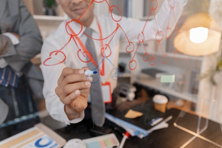 professional-man-drawing-flowchart-on-glass-board-2026-09-25-06-02-42-utc (Small)