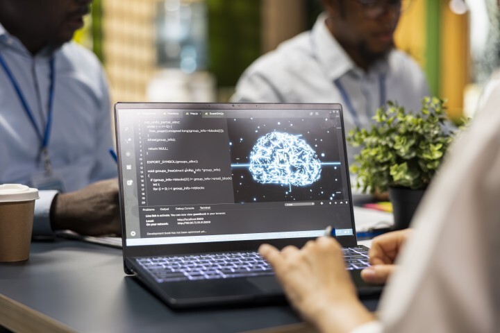 programmer-developing-artificial-intelligence-soft-2026-09-25-07-08-19-utc (Small)